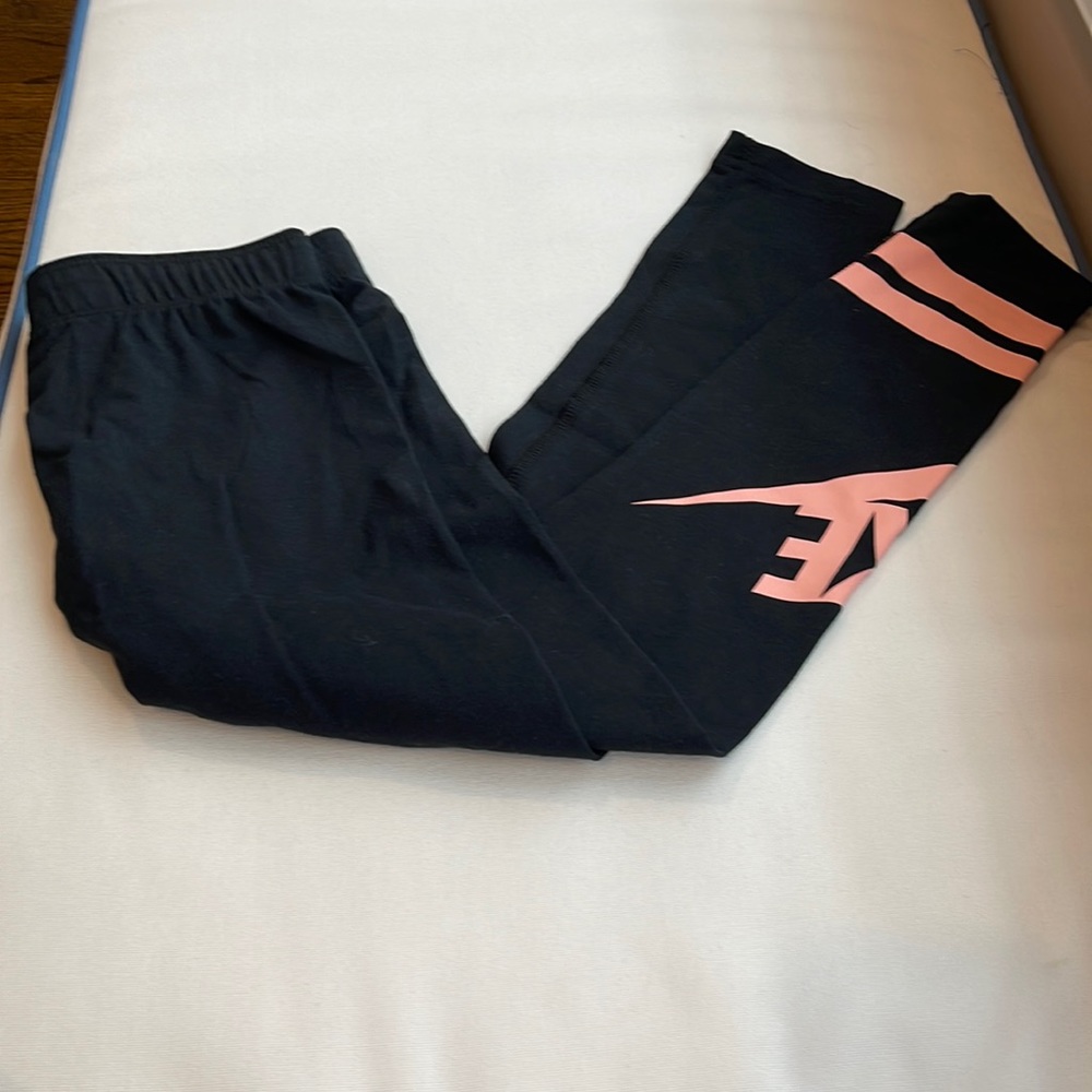 Like new girls black Nike leggings size small.